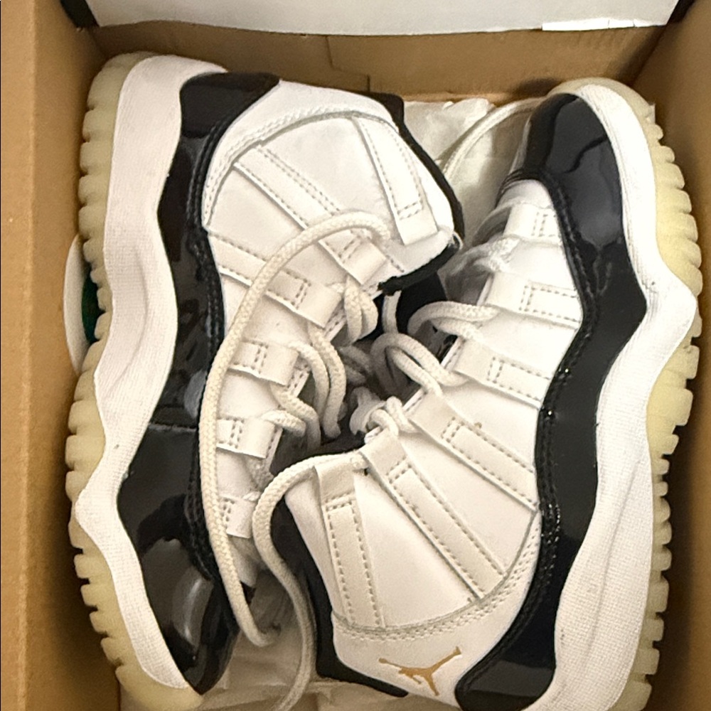 Jordan Kids Black and White Sneakers with Gold Accent